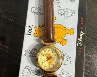 Reloj vintage de Winnie the Pooh de Disney Store, nuevo, en perfecto estado, con caja original, fabricado en Japón (DA-505).