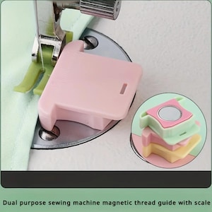 May include: A light pink magnetic sewing machine seam guide attached to the metal throat plate of a sewing machine. A small inset circle shows a stack of three guides in pink, light green, and yellow, each with a circular silver magnet.