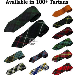May include: A selection of tartan ties in a variety of colours and patterns, including green, blue, red, and yellow. The ties are displayed against a white backdrop, with the text "Available in 100+ Tartans" at the top.