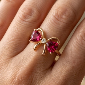 Sweetheart Ruby Bow Ring - Trillion Rubies & Central Diamond