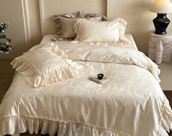 Juego de ropa de cama vintage de algodón y lino con bordado floral y ribete de encaje.