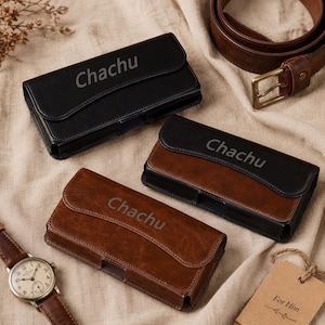 May include: Three leather phone cases in black, brown, and two-tone brown and black. Each case has the name "Chachu" engraved on the front. A brown leather belt, a watch, and a gift tag that says "For Him" are also visible.