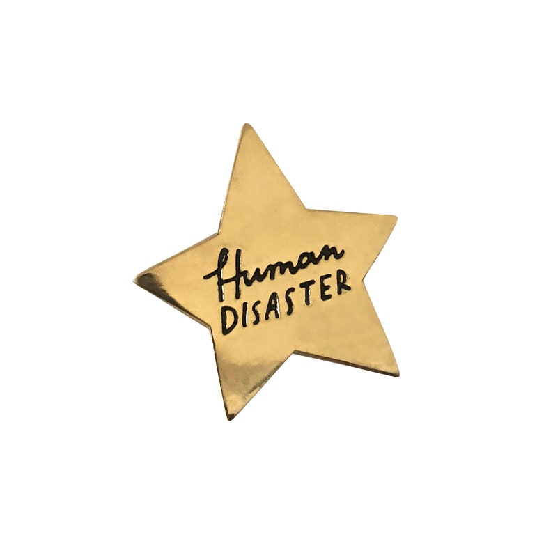 Human Disaster, gold star enamel pin image 2