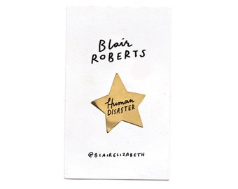 Human Disaster, gold star enamel pin