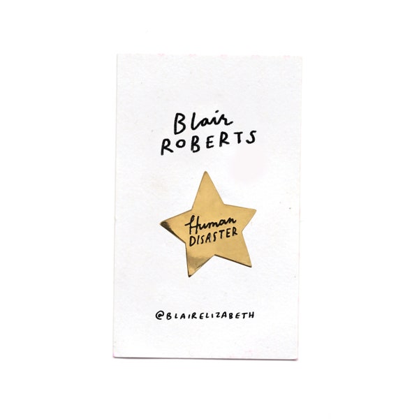 Human Disaster, gold star enamel pin