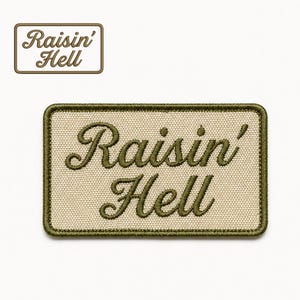 May include: A rectangular patch with the words "Raisin' Hell" embroidered in a cursive font. The patch has a tan background with a dark green border and lettering. A smaller version of the patch is in the upper left corner.