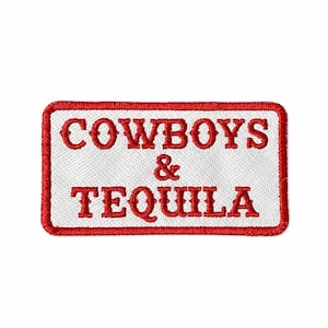May include: Rectangular embroidered patch featuring the words "Cowboys & Tequila" in red, decorative lettering. The text is on a white background, with a red border. The patch is designed for clothing.