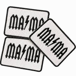 May include: Three rectangular embroidered patches with white backgrounds and black borders. Each patch features the black text "MA⚡MA" in a stylized, angular font, with a lightning bolt symbol replacing the letter "M" in the center.