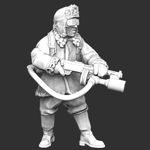 May include: A grayscale figurine of a person in a winter uniform, holding a weapon with a hose attachment. The figure wears a fur-lined hat with goggles, a long coat, and boots. The weapon is held with both hands.