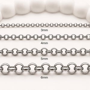 May include: Four silver-toned metal rolo chains arranged horizontally, labeled with their respective link widths of 3mm, 4mm, 5mm, and 6mm. Each chain features uniform circular links connected by smaller horizontal bars in a consistent pattern.