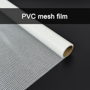 May include: A roll of white PVC mesh film featuring a consistent grid pattern. The material is tightly wound around a cylindrical cardboard core, displaying a semi-transparent, woven texture throughout the surface of the sheet.