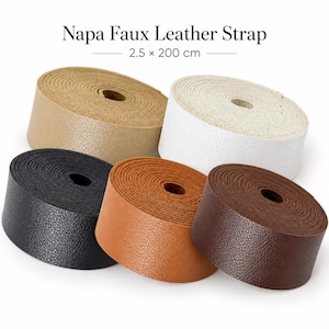 May include: Five rolls of Napa faux leather strap in black, white, tan, light brown, and dark brown. Each roll measures 2.5 x 200 cm. The material has a textured surface and is coiled into a circular shape with a hollow center for each individual roll.