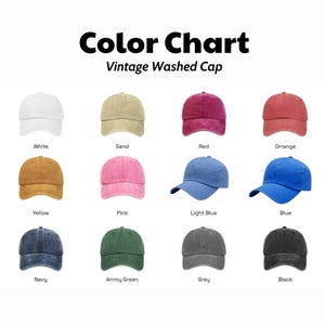May include: A color chart for a vintage washed cap featuring twelve baseball caps in white, sand, red, orange, yellow, pink, light blue, blue, navy, army green, grey, and black. Each cap is labeled with its corresponding color name below it.