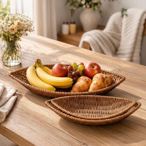 May include: A set of three ceramic mugs with a speckled, matte finish. The mugs are in shades of cream, light gray, and dark gray. Each mug has a simple, minimalist design, perfect for coffee or tea.