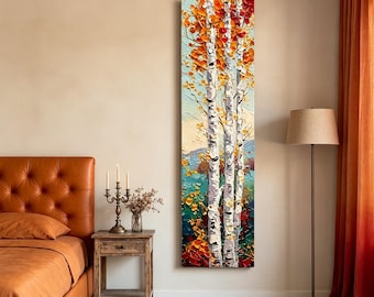 May include: Vertical oil painting of birch trees with white bark and orange and yellow leaves. The artwork has a textured, impasto style, with a blue and green background. The painting is displayed on a beige wall, next to a brown leather bed and a wooden nightstand.