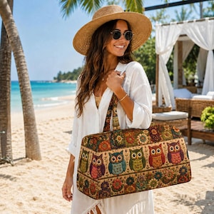 May include: A rectangular tote bag featuring a repeating pattern of colorful owls and floral motifs in shades of orange, green, blue, and purple. The bag has two sturdy shoulder straps and a structured design, showcasing a detailed textured print.