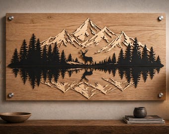 May include: A rectangular wooden wall art piece featuring a layered design of light-colored mountain peaks and a black silhouette of a forest and a standing deer. The composition includes a mirrored reflection effect, all mounted with four silver hardware standoffs.