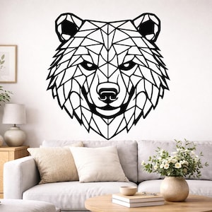 May include: A black geometric bear head wall art. The bear's head is constructed from interconnected triangles and lines, creating a modern, angular design. The artwork is mounted on a white wall, suitable for home decor.