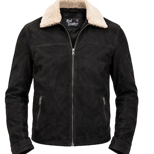 May include: A black suede jacket with a cream-colored shearling collar. The jacket features a full-length zipper, two side pockets, and a small logo patch on the chest. The jacket is made of real leather.