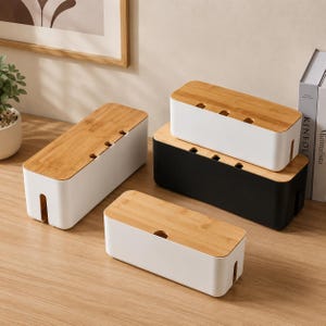 May include: A collection of rectangular cable management boxes featuring white or black plastic bases and removable bamboo wood lids. Each box includes side cutouts for cords and multiple small slots along the top surface for cable organization.