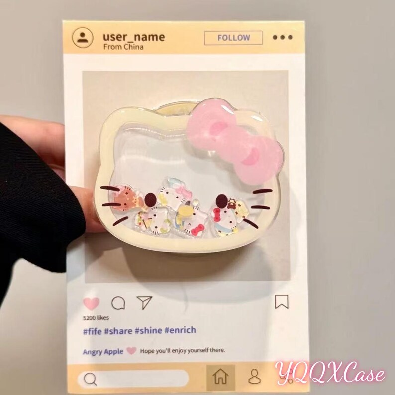 May include: A clear, Hello Kitty-shaped phone case with a pink bow and small, colorful character figures inside. The case is held in front of a social media-style background with the text "user_name From China" and "Angry Apple".