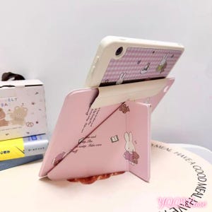 May include: A rustic wooden sign with the text "Welcome to our home" in white lettering. The sign features a distressed finish and a simple, inviting design, perfect for entryway decor.