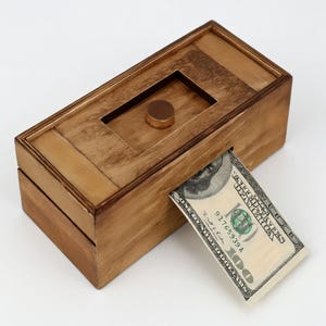 May include: A set of three ceramic nesting bowls in shades of blue, green, and white. The bowls feature a speckled glaze and a simple, modern design. The largest bowl is approximately 6 inches in diameter.