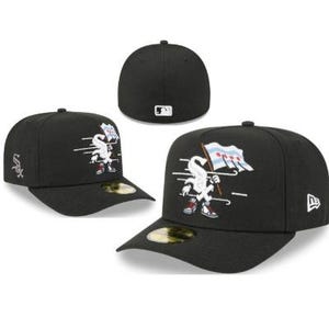 May include: Black baseball cap featuring the Chicago White Sox logo. The cap displays the team's logo on the front, a white and red stylized character holding a flag with the Chicago city flag design. The New Era logo is on the side.