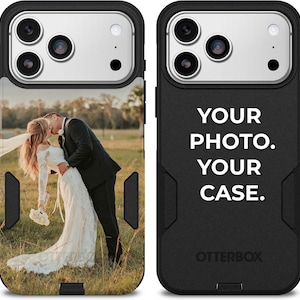 May include: Black and white phone case with a photo of a couple kissing on the left side. The right side of the case has the text "YOUR PHOTO. YOUR CASE." and the Otterbox logo.