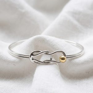 Made on Cape Cod. Bracelet with fishermans/ nautical knot, Brass ball & sterling silver cuff bangle. Cape Cod Lifestyle.