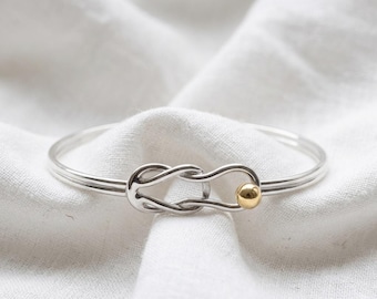 Made on Cape Cod. Bracelet with fishermans/ nautical knot, Brass ball & sterling silver cuff bangle. Cape Cod Lifestyle.