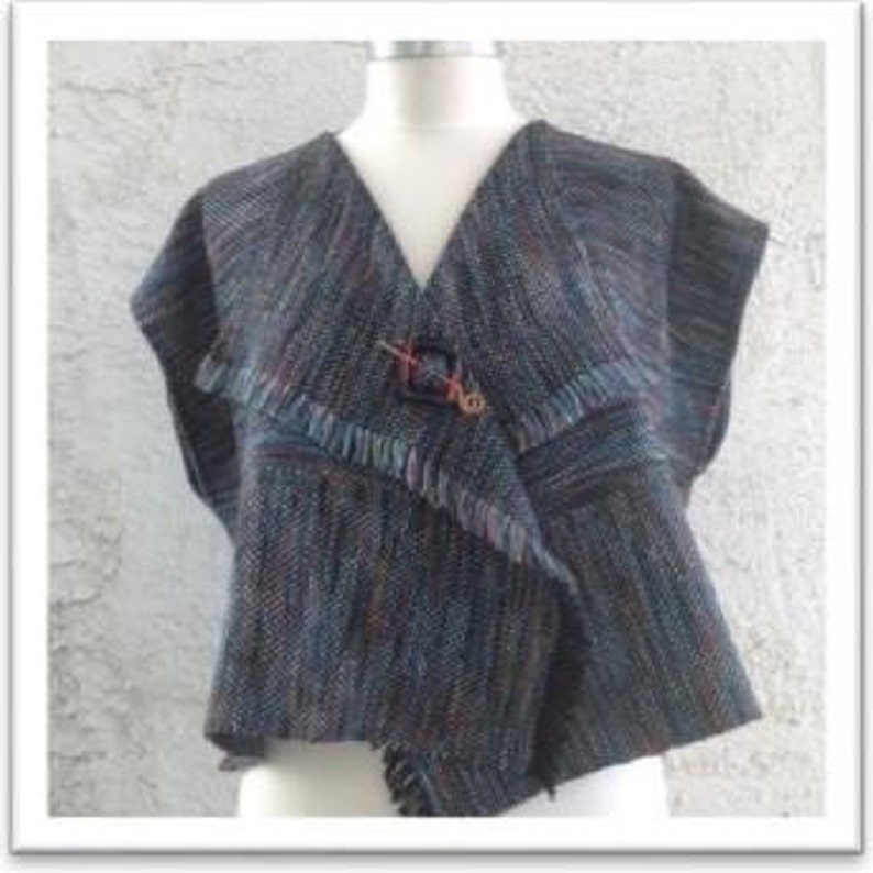 May include: A sleeveless, multi-coloured woven vest with a button closure. The vest has a V-neck and a slightly asymmetrical hem.