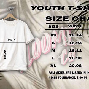 May include: White youth t-shirt hanging on a wooden hanger, with a size chart. The chart lists sizes XS to XL, with width and length measurements in inches. The text "YOUTH T-SHIRT SIZE CHART" is at the top.