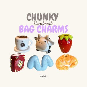 May include: A collection of handmade bag charms in various shapes. Includes a coffee cup, cow, strawberry, book, blue wave, and croissant. The text "CHUNKY Handmade BAG CHARMS" is displayed in the image.