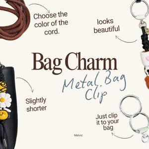May include: A bag charm with a metal clip, featuring a black cord and decorative beads. The charm includes a yellow and black bee, a white daisy, and a smiling yellow face. The image also shows a brown cord option.
