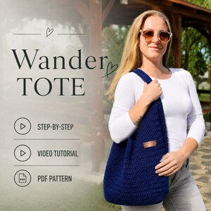 May include: A dark blue crochet tote bag with a rectangular brown leather-like label. The image includes text reading Wander TOTE, STEP-BY-STEP, VIDEO TUTORIAL, and PDF PATTERN, along with icons for play buttons and a PDF document symbol.