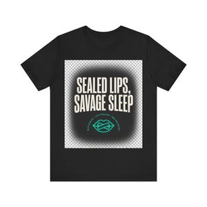 May include: A black short-sleeve t-shirt featuring a central graphic with the text "SEALED LIPS, SAVAGE SLEEP" in a bold, off-white font. Below the text is a teal outline of lips with a horizontal line across them and small circular text.