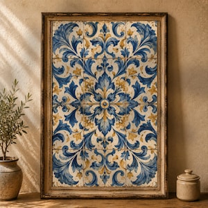 Pode incluir: Uma peça de arte mural retangular com uma grelha de doze azulejos com um padrão simétrico de folhas de acanto azuis e douradas. A obra está emoldurada numa moldura de madeira castanho-escura envelhecida com textura desgastada.