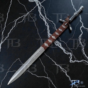 May include: A detailed sword with a silver blade and handle, featuring a brown leather-wrapped grip with silver diamond accents. The sword has a cross-shaped guard and is set against a dark background with lightning bolt patterns.