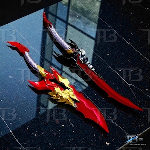 May include: Two decorative fantasy swords with red blades and gold and black accents. The swords have ornate handles and a glossy finish. The blades are approximately 24 inches long.