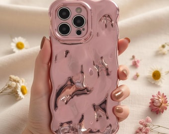 Funda para iPhone con diseño de burbujas 3D y textura arrugada de silicona suave.