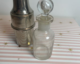 French travel cologne bottle with mirrored chrome case