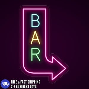 May include: A neon sign in the shape of an arrow, with the word "BAR" in bright, colorful letters. The sign has a pink outline and a dark background. The letters are blue, yellow, and green.