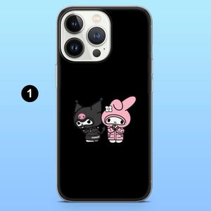 May include: Black phone case featuring a cartoon illustration of two characters. One character is black with a pig nose and the other is pink with a flower on its head. The word "KUROMI" is printed on the bottom.
