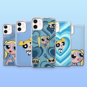 May include: A collection of five clear phone cases featuring the cartoon character Bubbles from The Powerpuff Girls. Each case has a different design, including Bubbles in various poses and patterns with blue backgrounds.