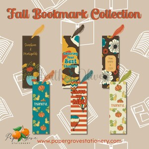 May include: A collection of six rectangular bookmarks featuring various fall-themed designs, including floral patterns, pumpkins, and hot air balloons. Each bookmark includes a colorful tassel at the top and printed text such as Sunshine & Marigolds, Entering Your Best Chapter, Stay Warm & Cozy, Thankful, and Enjoy The Ride.