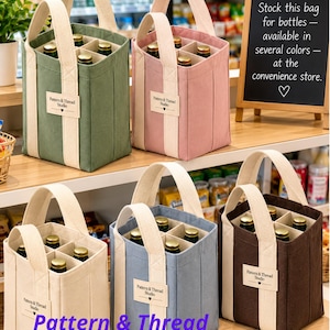 May include: Five canvas bottle bags in olive green, dusty pink, cream, slate blue, and dark brown. Each bag features cream-colored handles, a six-compartment interior, and a label reading Pattern & Thread Studio with a heart icon.