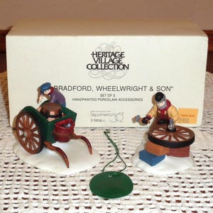 Dept 56 Heritage Village Set of 2 &quot;C. Bradford, Wheelwright & Son&quot; Accessory with Tag/ Box