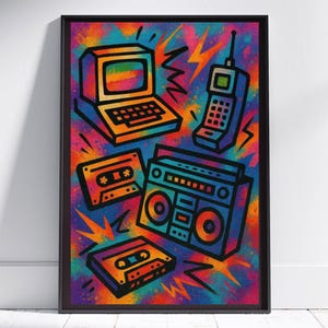 May include: A framed wall art print featuring a vibrant, multi-colored spray paint background with black-outlined illustrations of retro technology, including a desktop computer, a handheld mobile phone, a boombox, and two cassette tapes.