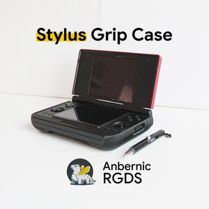 May include: Black handheld gaming console with a red trim, open to show a screen. A black stylus pen lies next to the console. The text "Stylus Grip Case" is at the top, and the logo "Anbernic RGDS" is at the bottom.